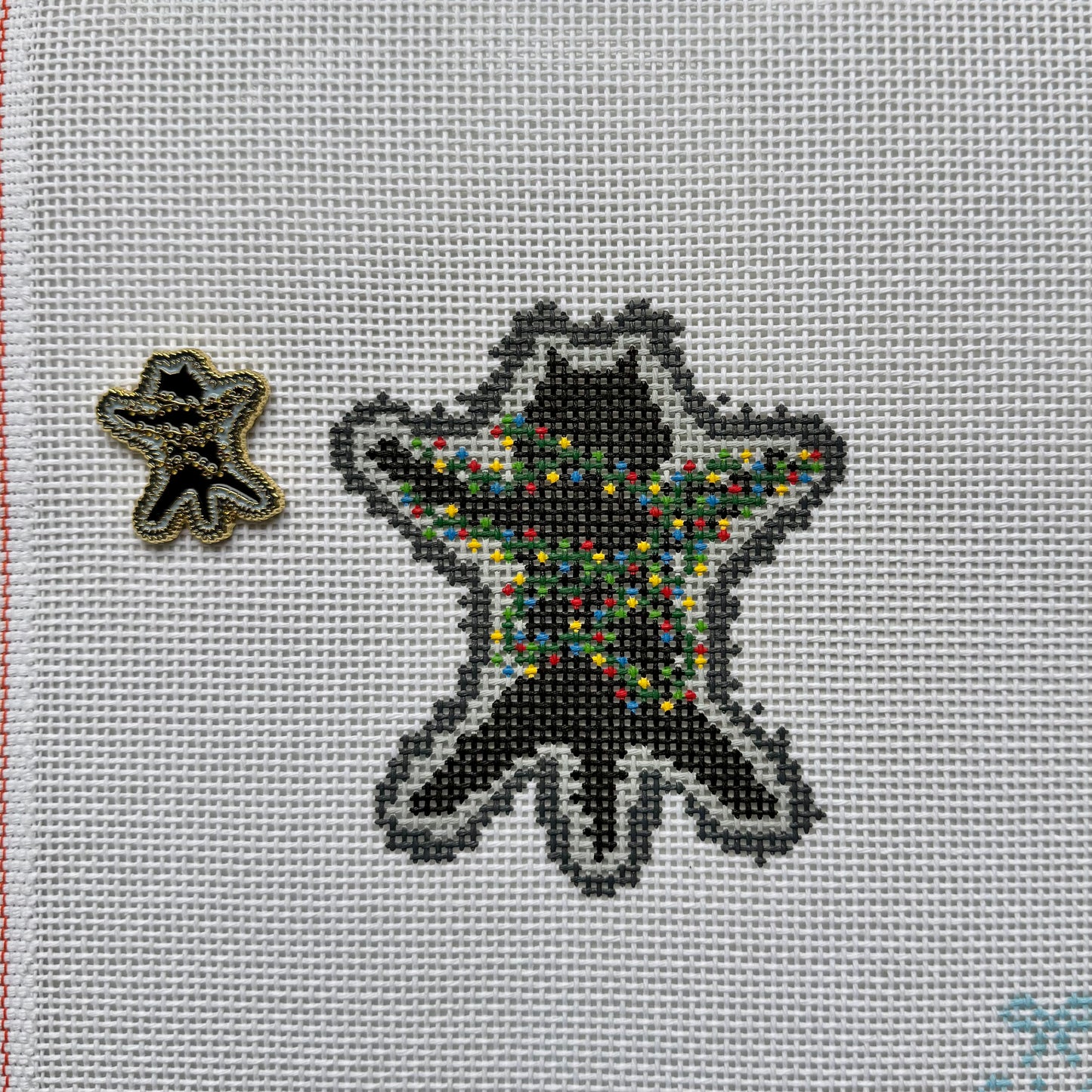 Needleminder Fried Cat