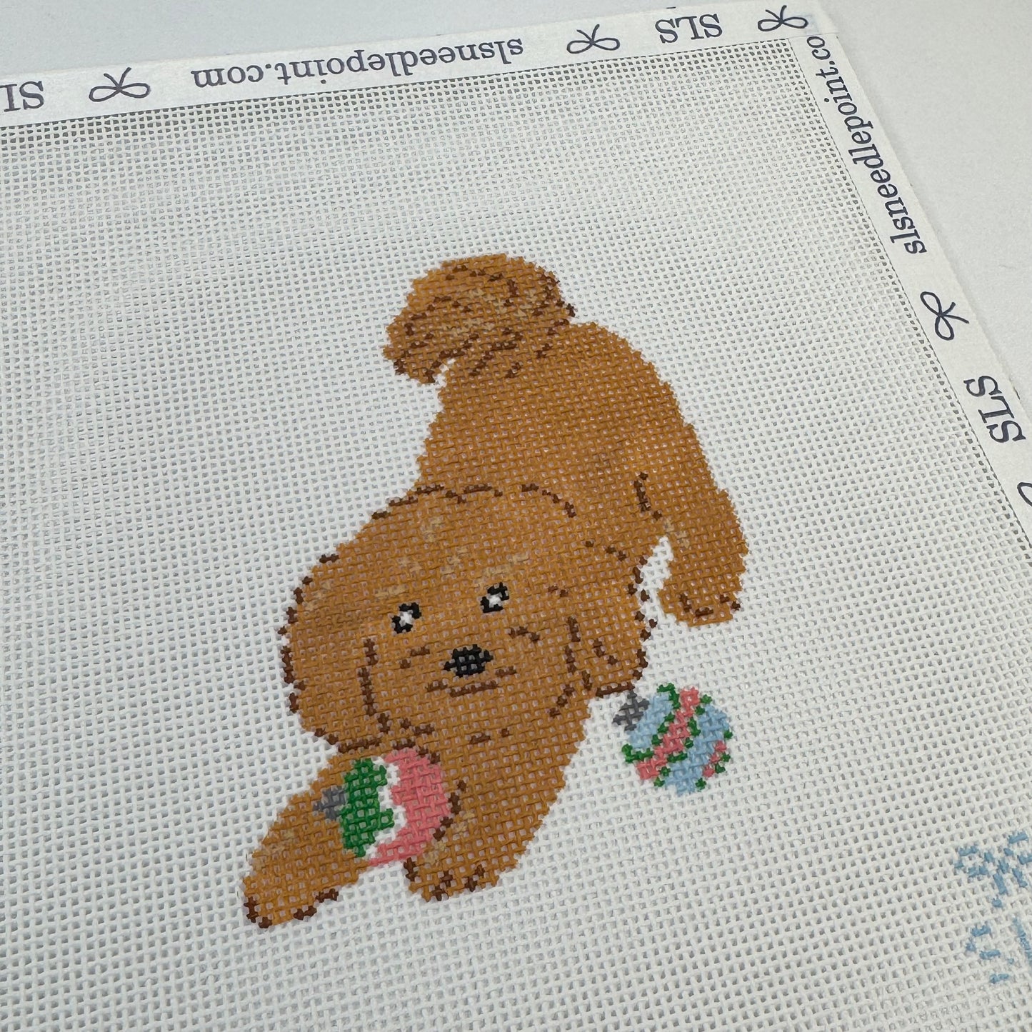 Puppy Playing with Ornaments