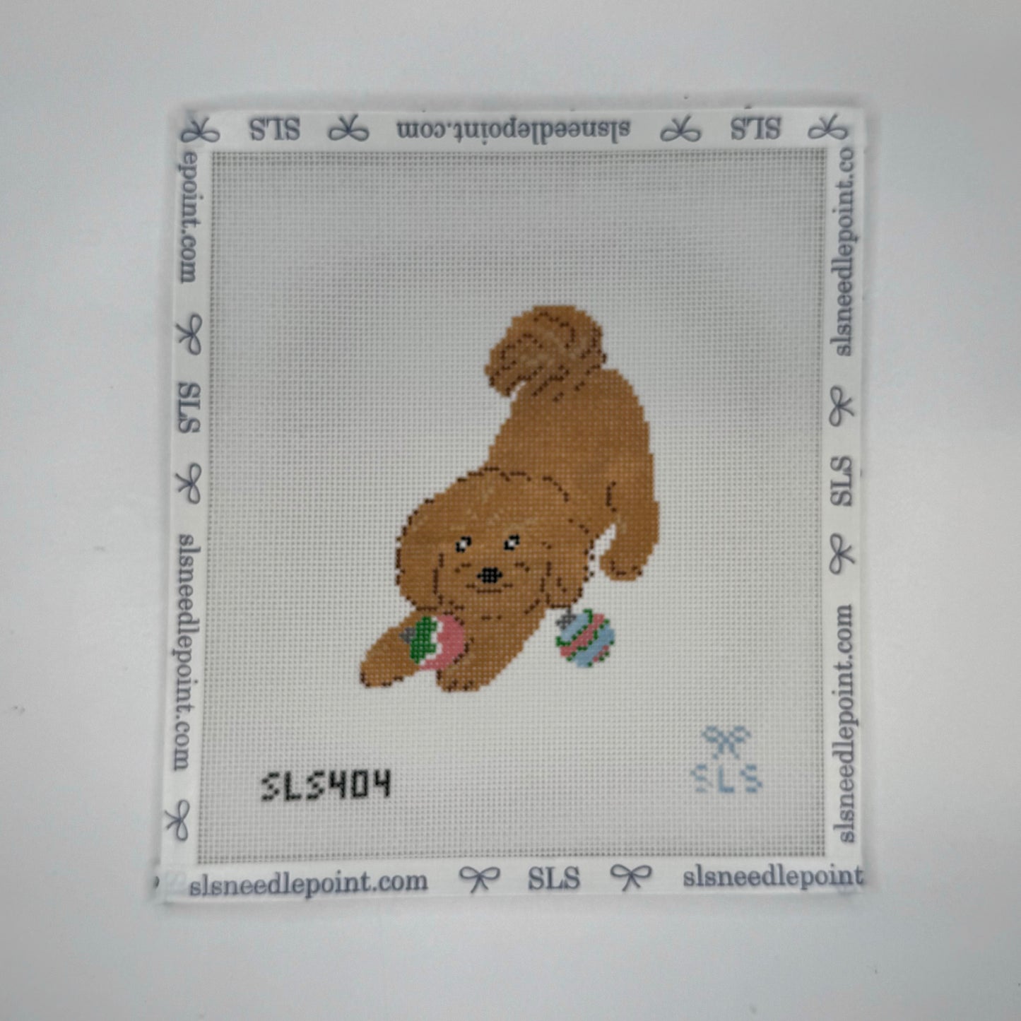 Puppy Playing with Ornaments